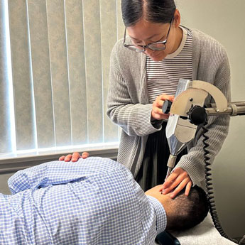 Orange chiropractic adjustment